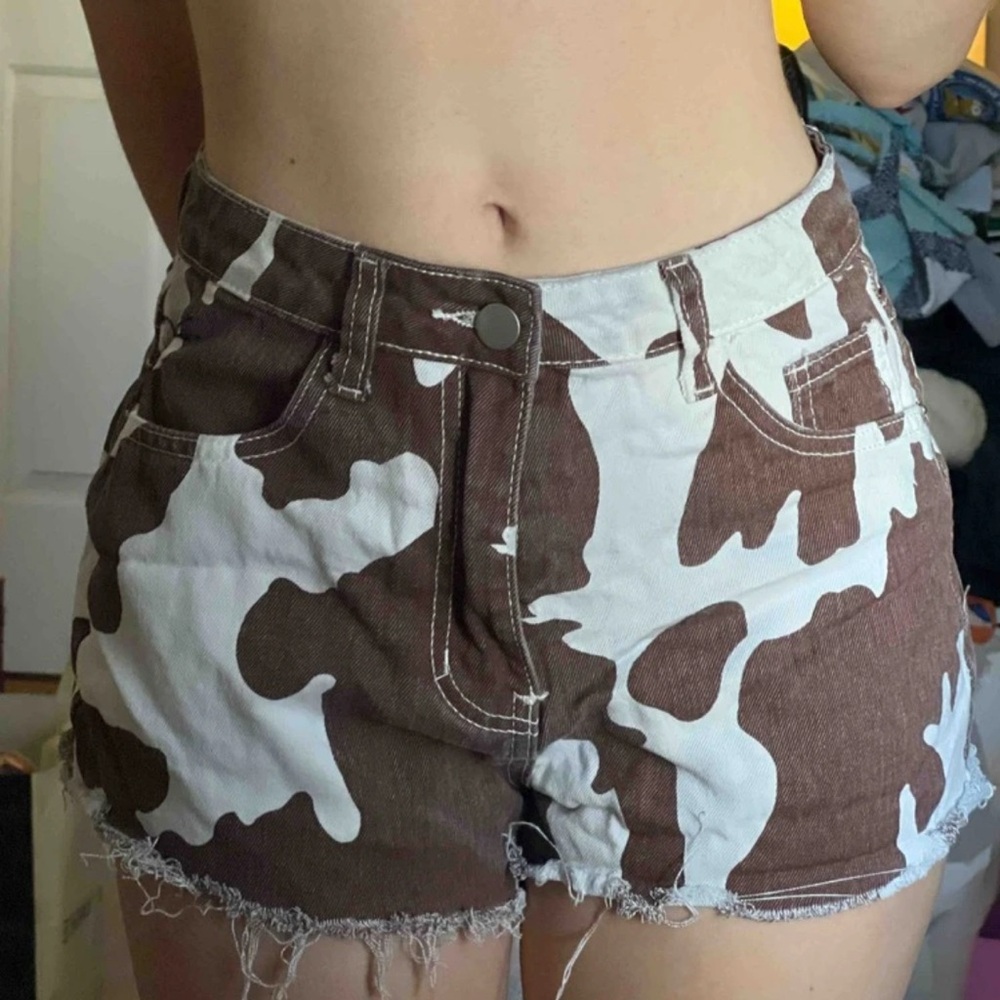 SHEIN Brown and White Cow Print Jean Shorts